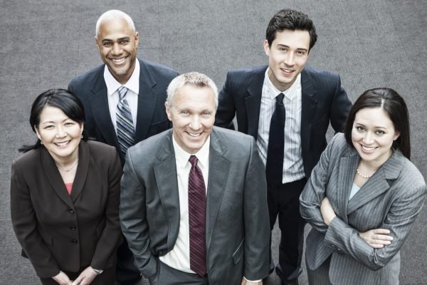 Closeup of a mixed race group of business people
